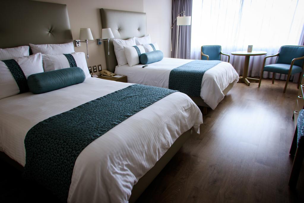 Grand Cantalagua Hotel Morelia, BW Signature Collection ภายนอก รูปภาพ A room at the hotel